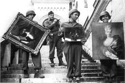 MFAA_Officer_James_Rorimer_supervises_U.S._soldiers_recovering_looted_paintings_from_Neuschwanstein_Castle.jpg