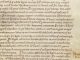 Page de manuscrit latin du début du XIIe siècle, écriture caroline sur une colonne, rubriques rouges en marge : le chapitre des signes de la main pour demander les livres au scriptorium.
